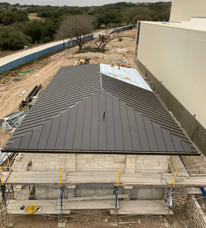 Metal roof new construction with scaffolding in Waldwick